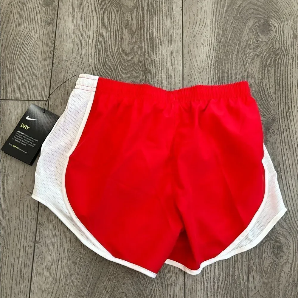 Nike gold running shorts with underwear lining